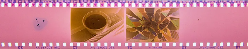 Negative strip showing two correctly exposed and two under exposed photos